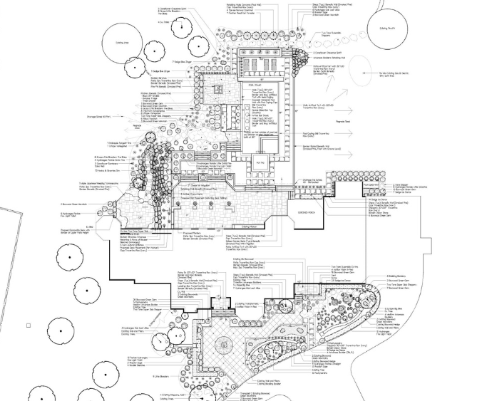 A black and white sketch of design build plans