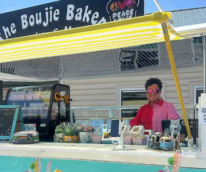 A closeup of the van setup for The Boujee Baker vending outside of Wasson's Muncie Garden Center