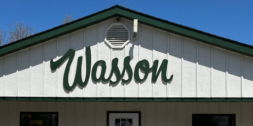 A closeup of the front entrance with a sign to Wasson's Union City Garden Center